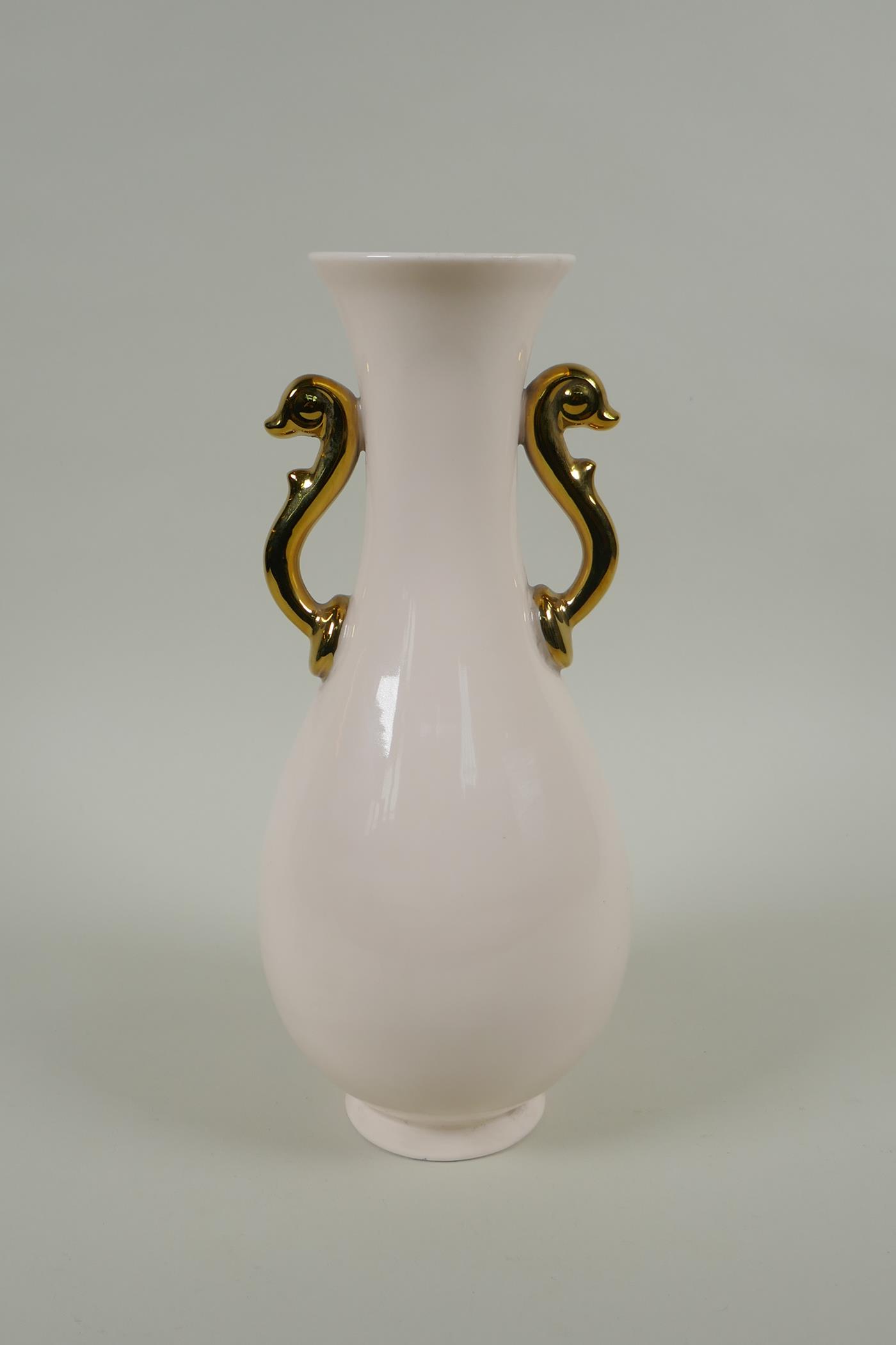 A Chinese cream glazed porcelain pear shaped vase with two gilt handles and raised prunus - Image 3 of 4