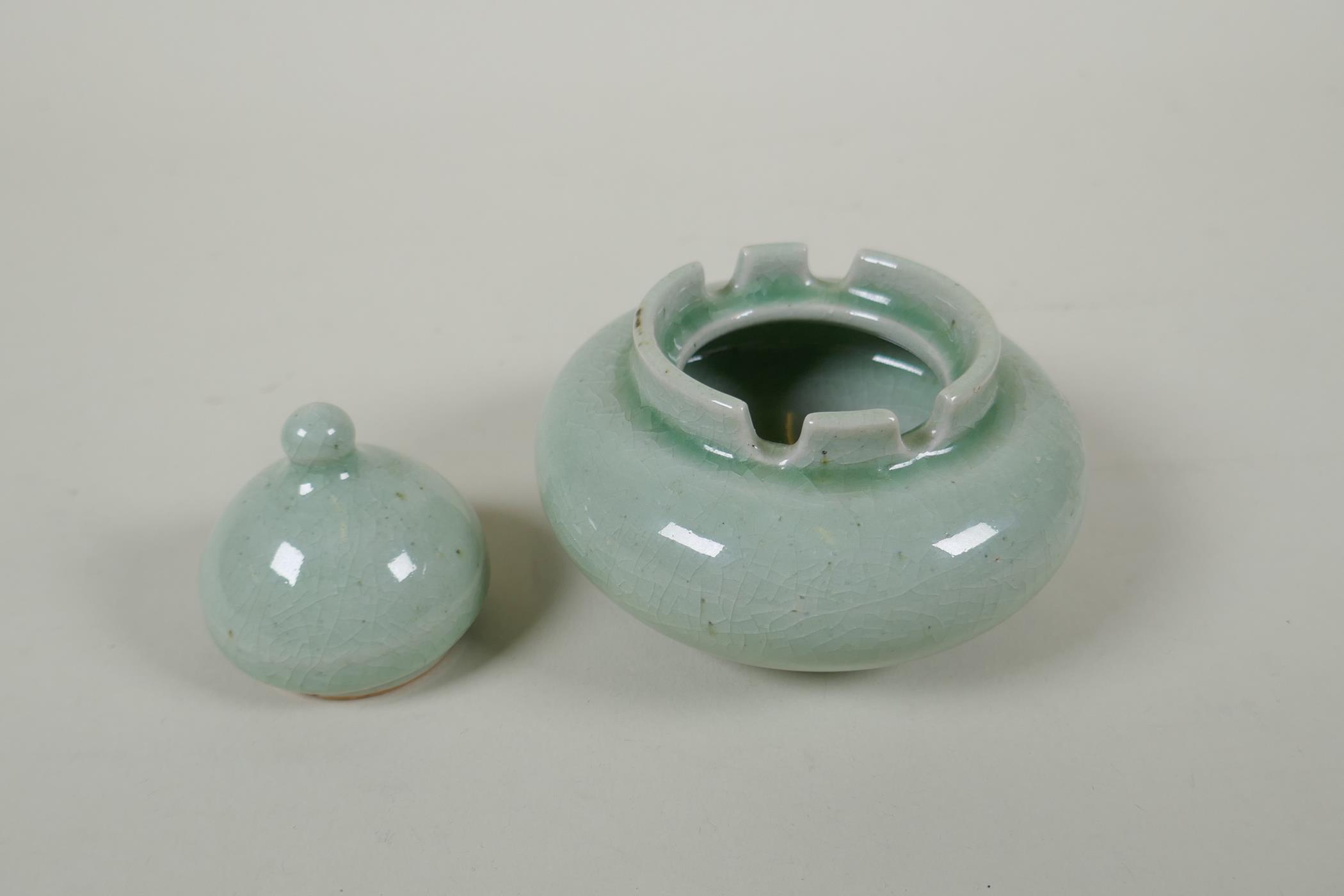 A Chinese celadon crackle glazed porcelain censer and cover, 11cm diameter - Image 2 of 4