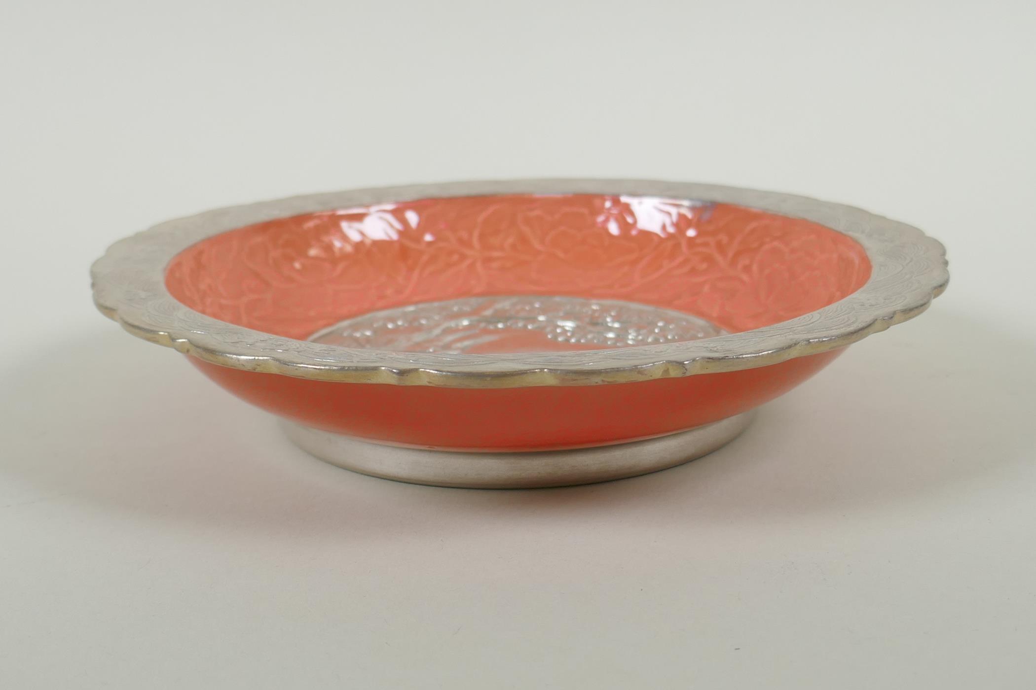 A Chinese salmon pink and silver glazed porcelain dish with lobed rim, with raised deer and crane - Image 3 of 5
