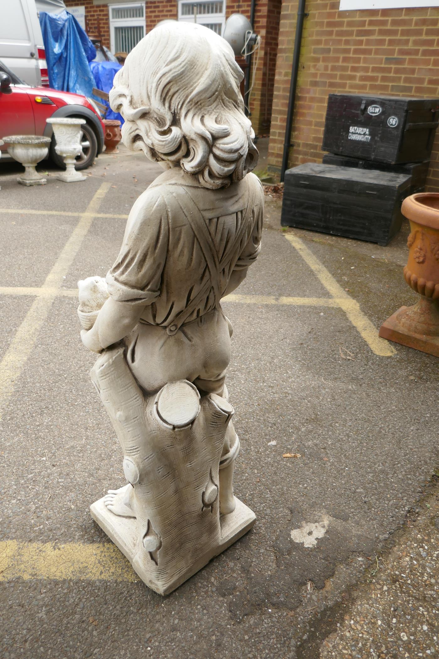 A painted reconstituted stone/concrete garden figure, boy with two puppies, 120cm high - Image 4 of 6