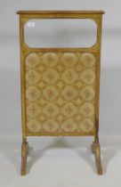 A C19th giltwood firescreen with glazed upper and inset textile panel, 50 x 94cm