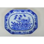 A C19th Chinese blue and white porcelain export ware dish, with historic pinned repairs, 36 x 27cm