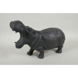A bronzed metal hippopotamus, 34cm long