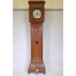 C19th Continental oak 30hr longcase clock with enamel dial and Roman numerals, 234cm high