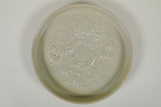 A Chinese celadon glazed porcelain shallow dish, with underglaze decoration of figures, dragons