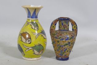 An Eastern ceramic vase with Iznik decoration and a smaller vase, 18cm high