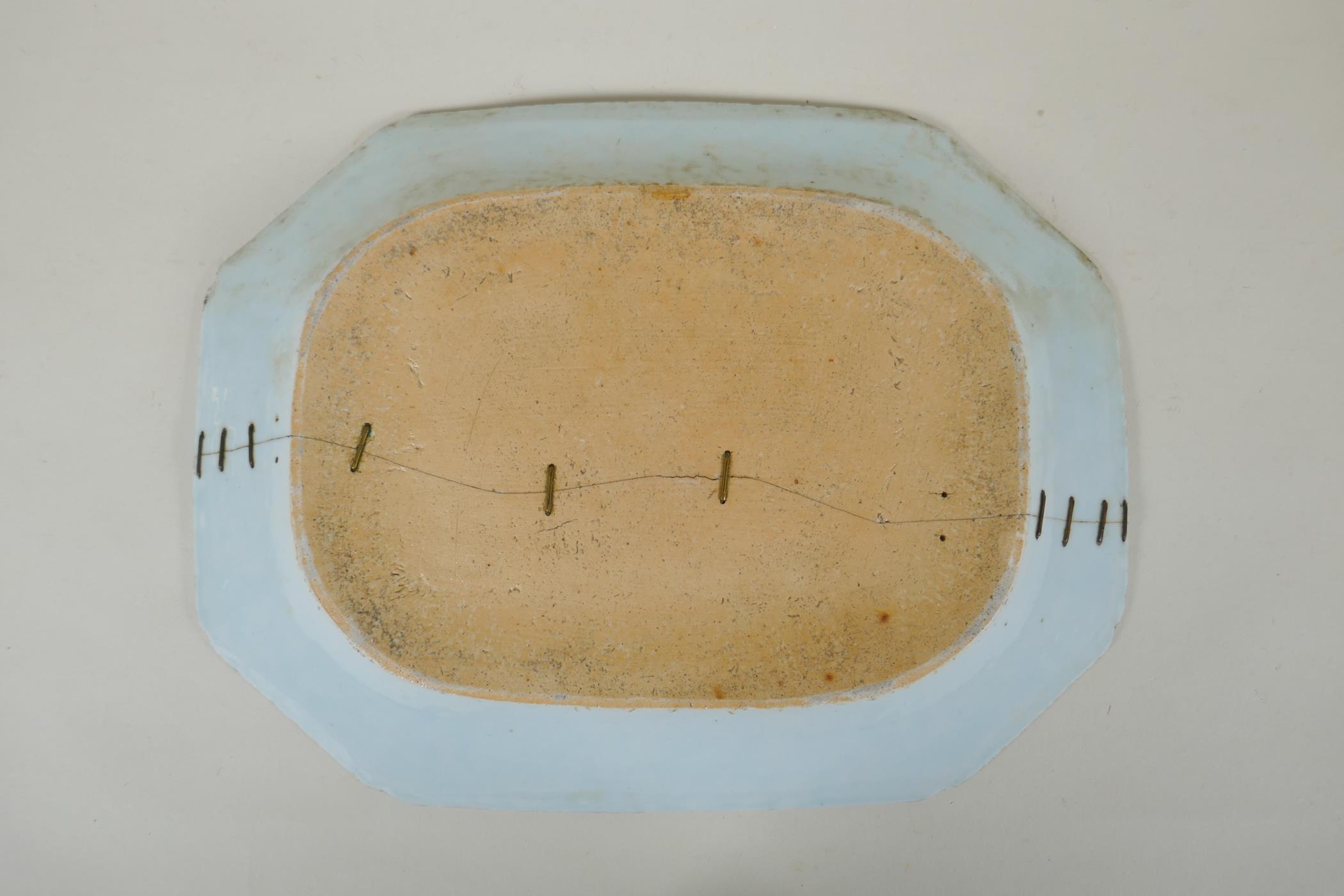 A C19th Chinese blue and white porcelain export ware dish, with historic pinned repairs, 36 x 27cm - Image 3 of 3