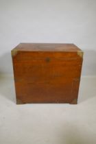 A C19th teak silver chest with campaign/military style brass mounts and handles and inset panel,