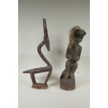 An African Bamana tribe carved wood Chi Wara antelope, together with a carved wood figure with