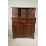 A C19th mahogany chiffonier, with two cupboards flanking a pen shelf, and a single drawer over two