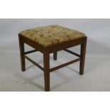 A C19th oak footstool with drop in tapestry seat, 45 x 45 x 45cm