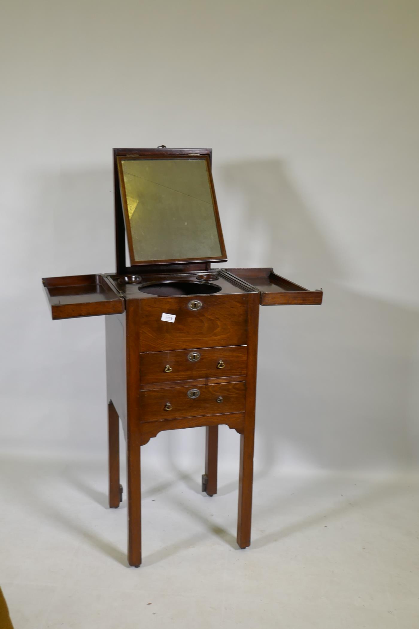 A Georgian mahogany gentleman's washstand, the fold out top with fitted interior and turned wood - Image 2 of 9