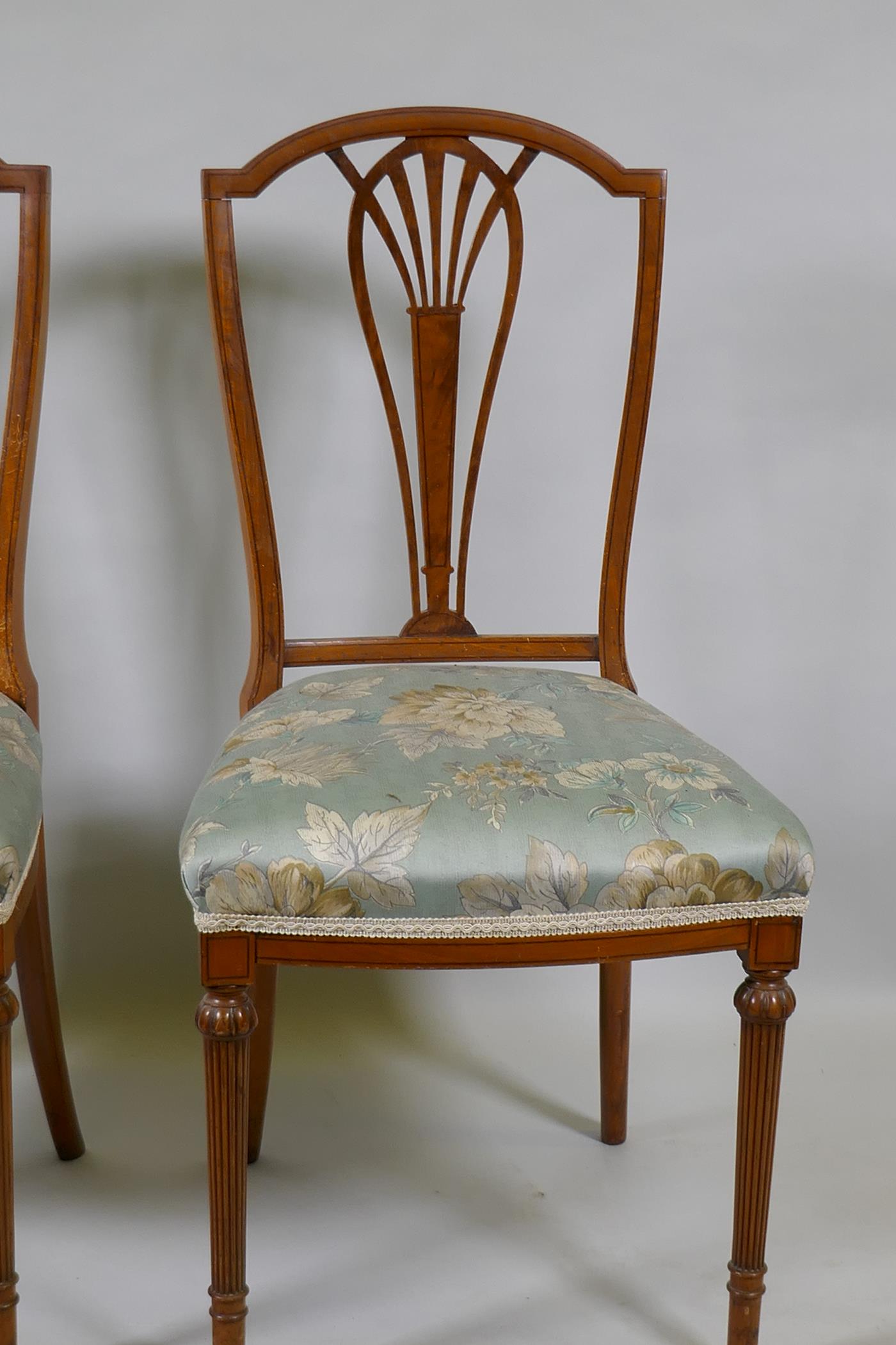 A pair of Victorian satinwood bedroom side chairs with pierced splats, raised on reeded supports ( - Image 2 of 3