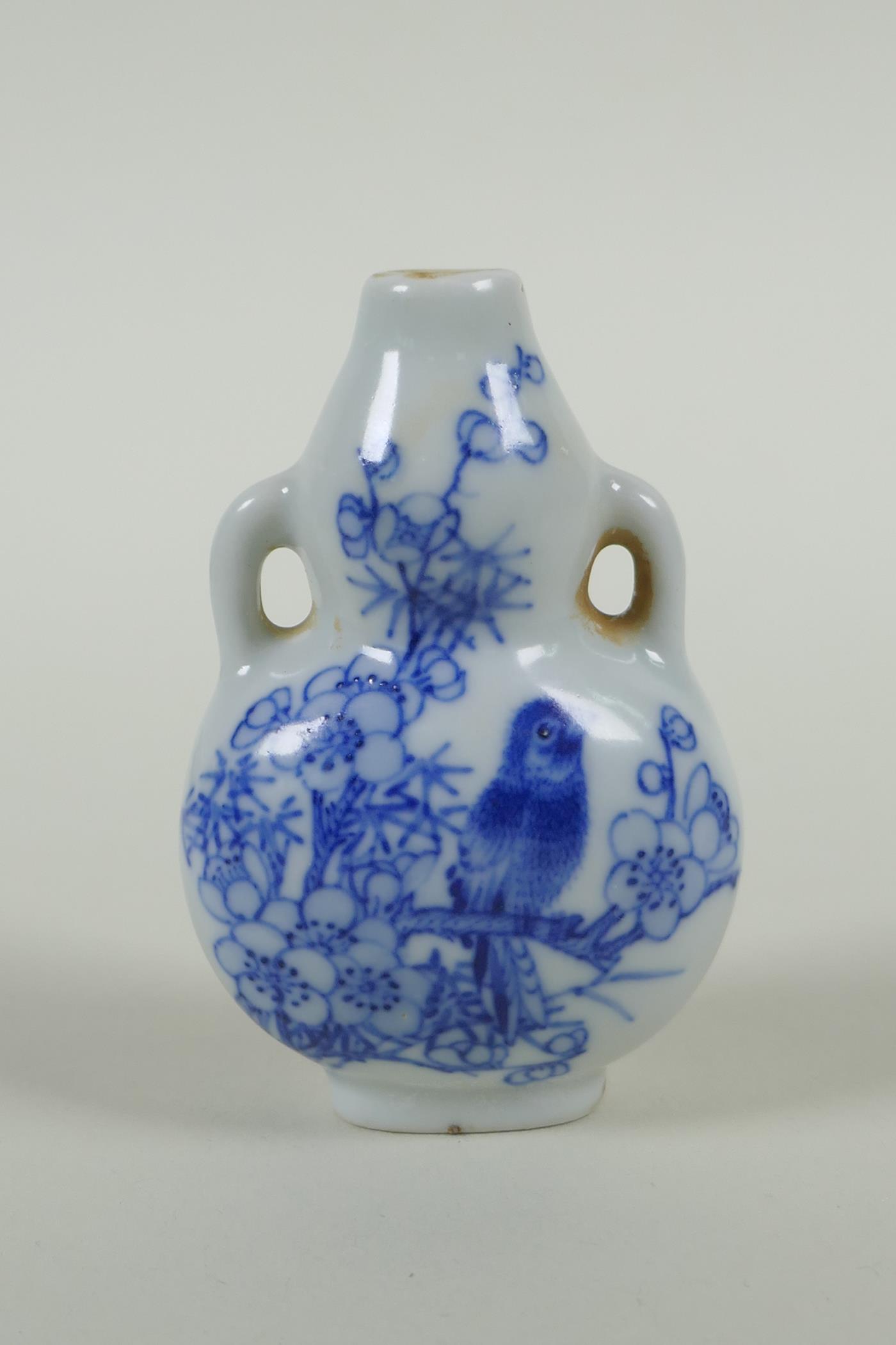 A Chinese blue and white porcelain double gourd two handled snuff bottle decorated with birds