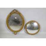 A vintage gilt oval wall mirror, 72cm high, and a later circular convex mirror