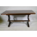 An oak veneered refectory style table, 153 x 77 x 74cm