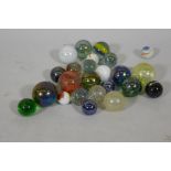 A quantity of large vintage marbles with speckled and lustre finish, largest 4cm diameter