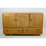 An Ercol blond elm Windsor sideboard, Model 468, 129 x 44cm, 76cm high