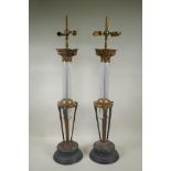 A pair of glass column table lamps with brass mounts, 79cm high