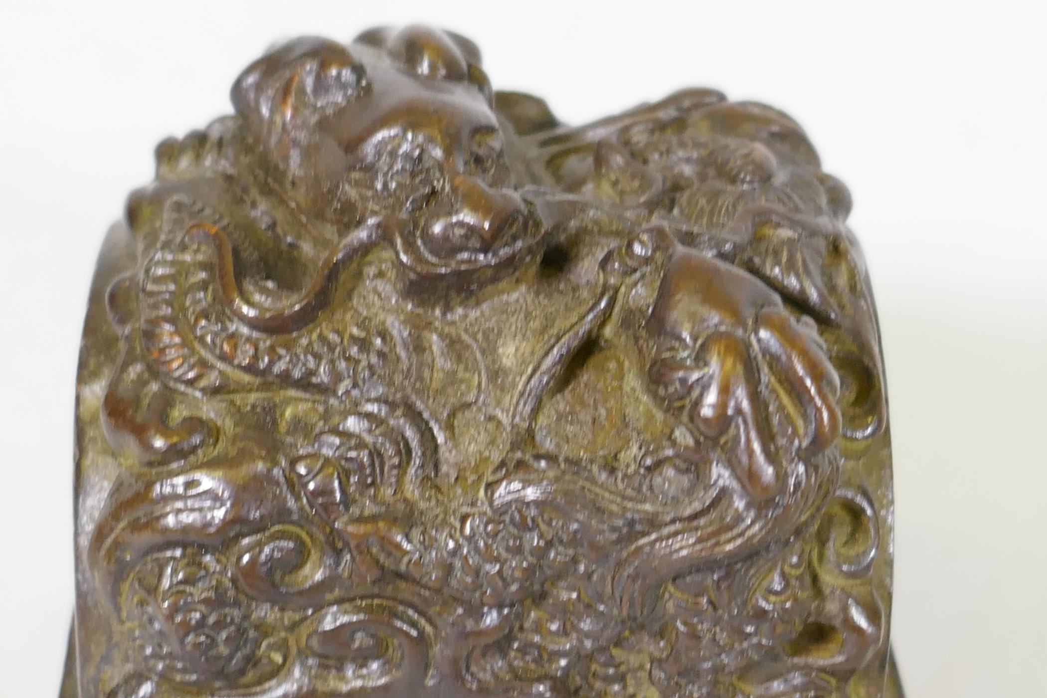 Chinese bronze seal with raised dragon decoration, 6 x 6 x 7cm high - Image 3 of 5