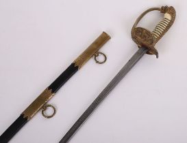IMPERIAL GERMAN NAVAL OFFICERS SWORD WITH PRESENATION AND DAMASCUS BLADE