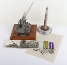 Presentation Trophy of a Anti-Aircraft Gun and Medals Relating to Sergeant Smith ‘The Flying Bomb Vi