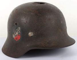 WW2 German Army M-35 Double Decal Battle Damaged Steel Combat Helmet Attributed to Leutnant Becker