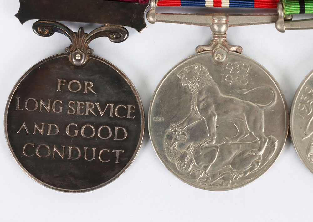 A Second World War Long Service Medal Group of Four to a Corporal of Horse in the Royal Horse Guards - Image 5 of 7