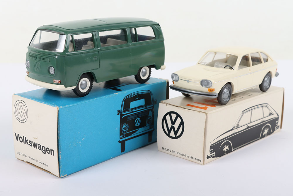 Two Volkswagen Cursor Plastic Models