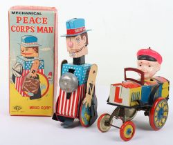 Boxed SY Toys mechanical tinplate Peace Corps Man, Travelling Sam, Japanese 1960s