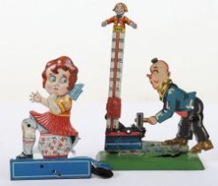 A tinplate Gely (Georg Levy) circus Strong Man High Striker novelty toy, German 1920s