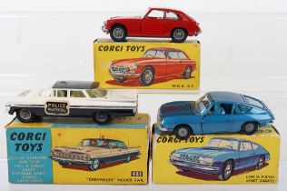 Three boxed Corgi cars