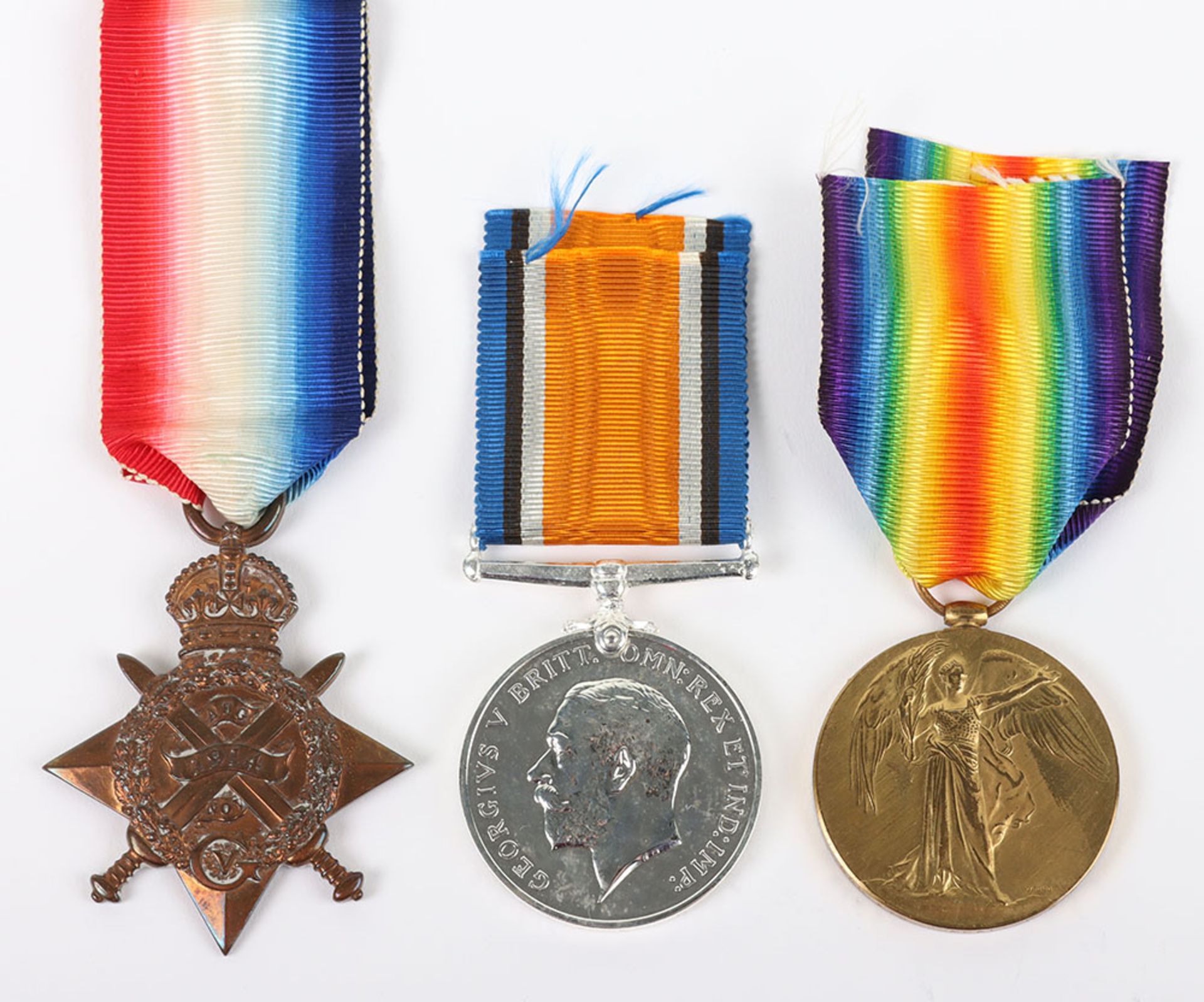 A 1914 star trio of medals to a private in the Royal Army Medical Corps who was awarded the Military