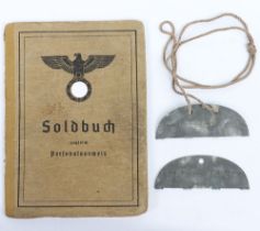 WW2 German Soldbuch to Feldwebel F. Ehrmann. Lds. Sch. Batl 633, Stalag IXB + matching ID dog tags.