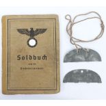 WW2 German Soldbuch to Feldwebel F. Ehrmann. Lds. Sch. Batl 633, Stalag IXB + matching ID dog tags.