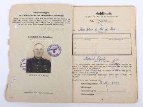 WW2 German SS-Polizei Soldbuch to Oberwachmeister der Reserve Robert Schulz. Late, 1945 issue, Schut