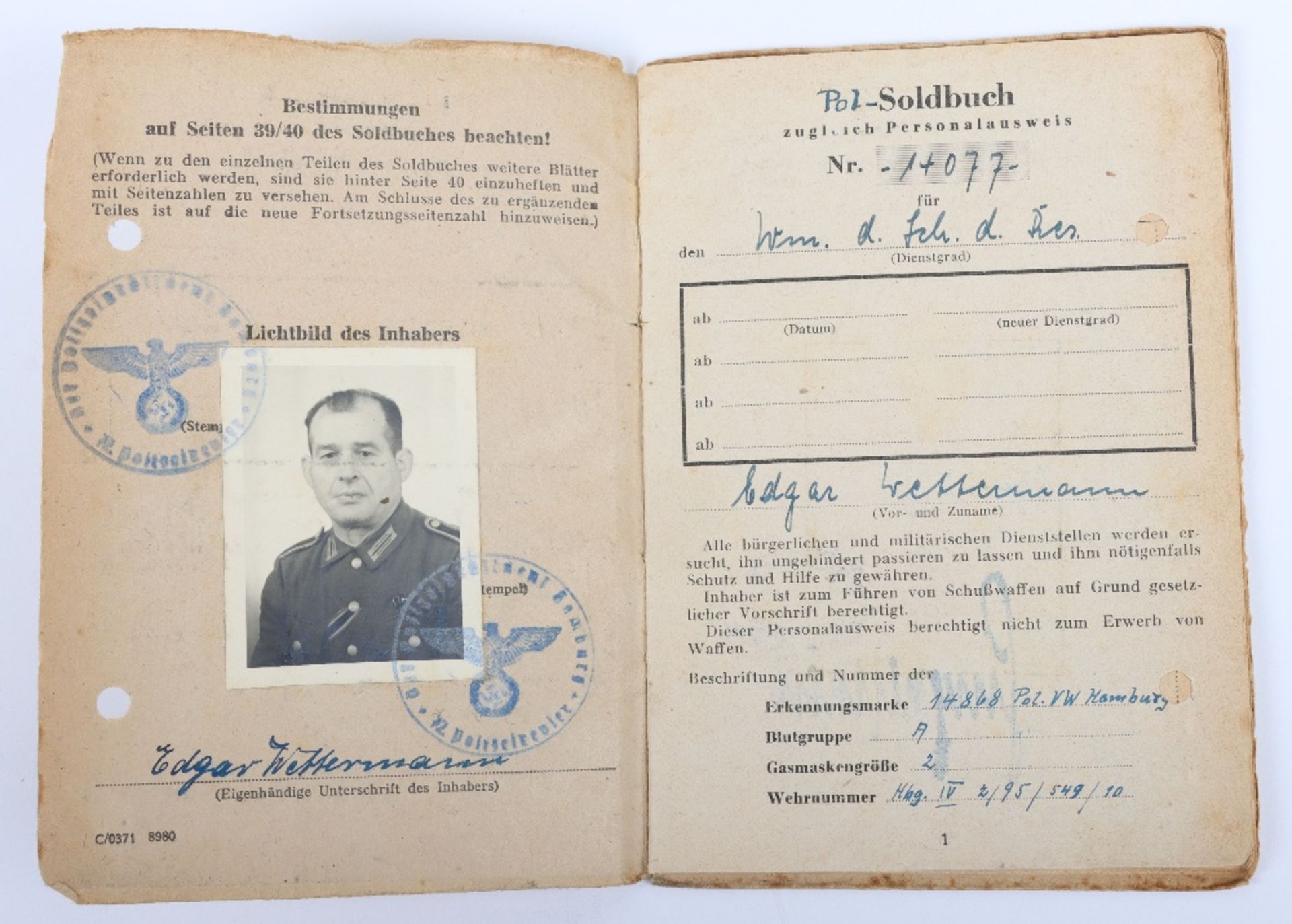 WW2 German SS-Polizei Soldbuch to Edgar Wettermann, late 1945 issue Hamburg