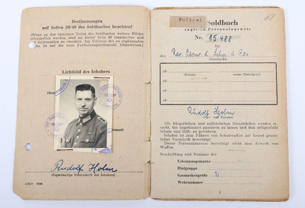 WW2 German SS-Polizei Soldbuch to Oberwachmeister der Reserve R. Holm. Late 1945 issue, Schutzpolize