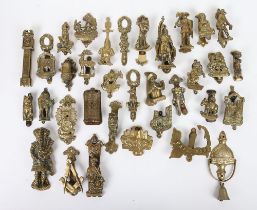 A selection of brass door knockers