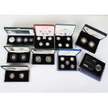 A selection of Royal Mint silver proof cased coins