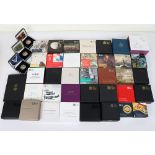 A large amount of cased silver proof Royal Mint coins, including £5, £2, commemorative issues, some