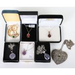 Three modern 9ct and gem set necklaces (including white gold)