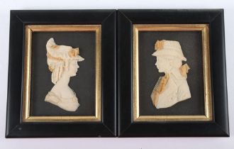 A pair of wax portraits by Leslie Ray