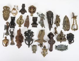 A selection of mostly brass door knockers