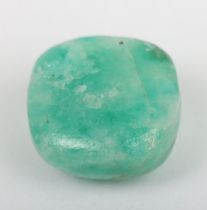 An Emerald cabochon, circa 7ct