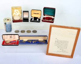 Selection of silver items of jewellery, including bangle, with an Imperial Service Medal and framed