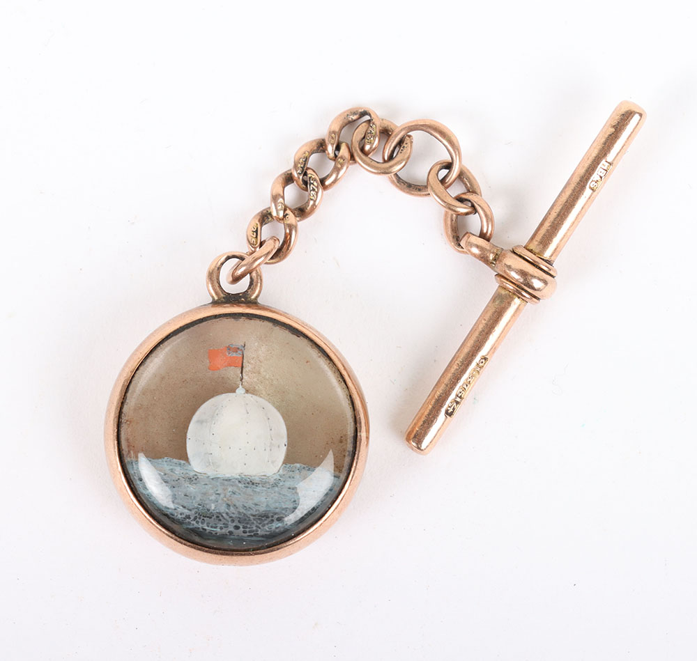 An interesting late 19th/early 20th century 9ct gold fob with Essex crystal glass painted circular p