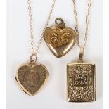 Two 9ct gold heart lockets with a 9ct gold bible locket