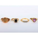 Four 9ct gold rings