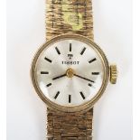 A 9ct gold Tissot ladies wristwatch and strap